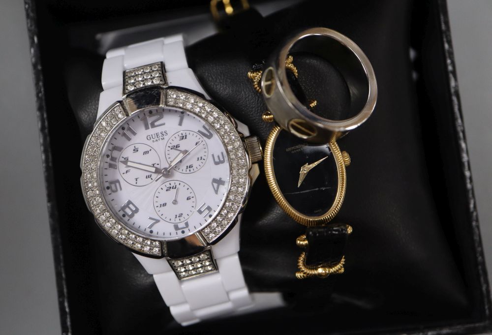 Two watches- Guess & Raymond Weil and a ring.